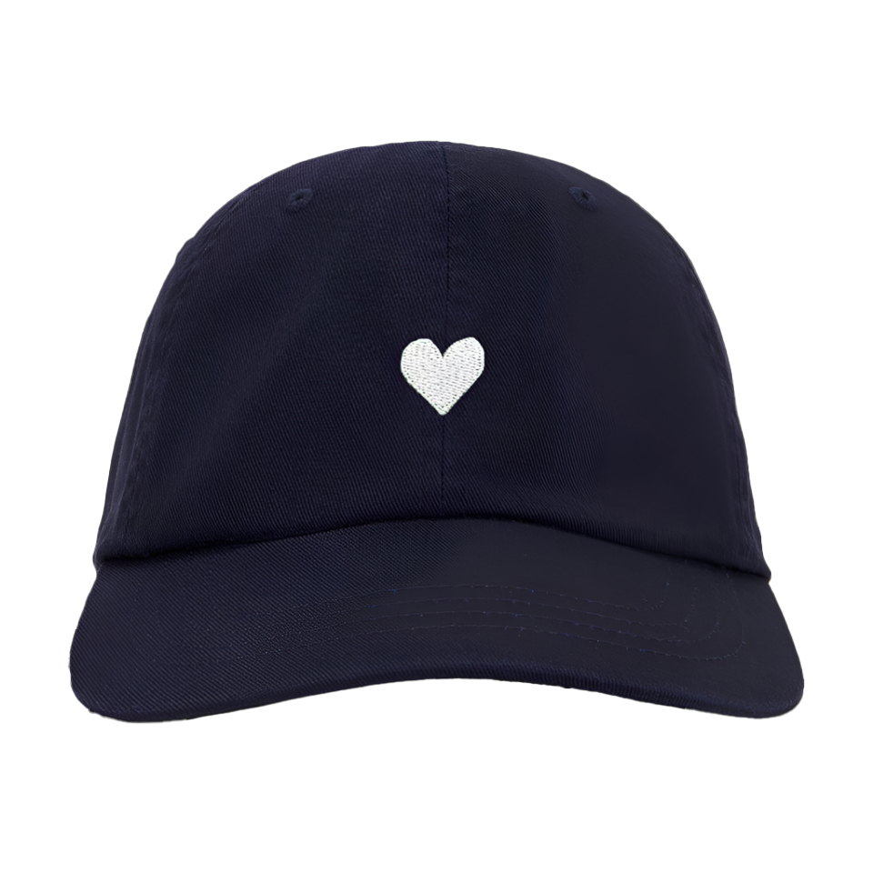 Navy blue cotton womens baseball cap with a white heart emblem embroidered by Atticus Poetry 